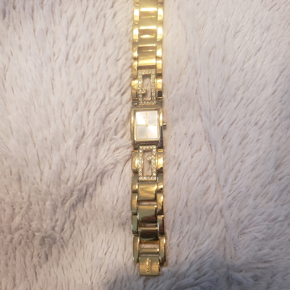 Womans Guess watch/with diamonds